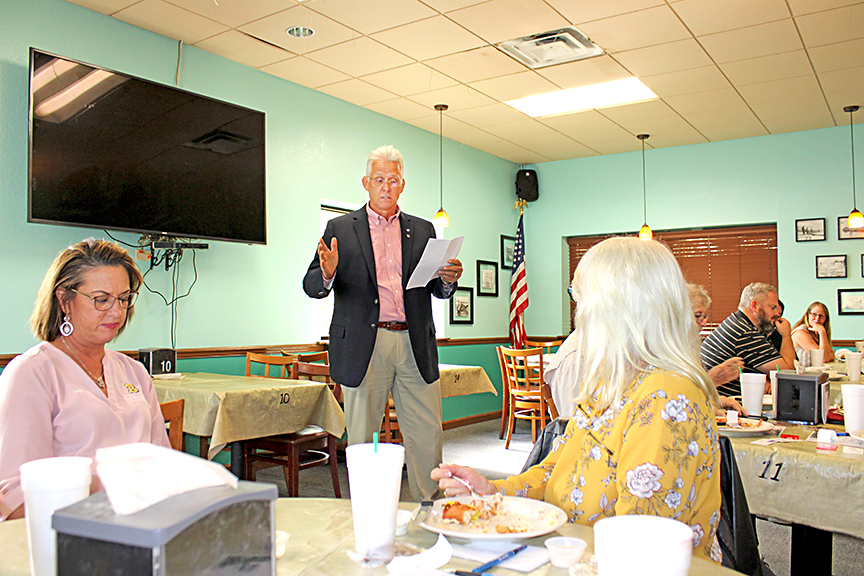 Property Appraiser Ed Brimner speaking at the Realtors luncheon at Seineyard at Wildwood last week.